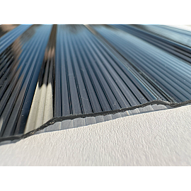 Policarbonat compact/solid cutat trapez 50/5, grosime 1mm, rolă 10 ml,  protejat UV, lățime 1.26m, negru (preț/rolă)