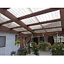 Placă din policarbonat compact/solid 1mm x 1060mm x 2000mm, cu profil trapez 76/18 multiliniar maro-coniac