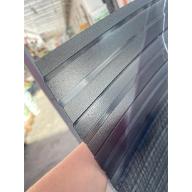 Policarbonat compact/solid cutat trapez, la rolă, grosime 1mm, protejat UV, lățime 1.26m (vânzare la metru liniar), gri