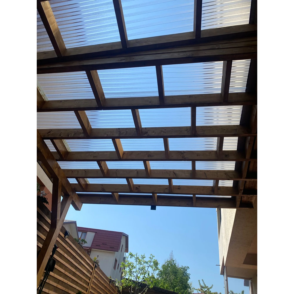 Policarbonat compact/solid cutat trapez, la rolă, grosime 1mm, protejat UV, lățime 1.26m (vânzare la metru liniar), transparent-clar