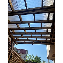 Policarbonat compact/solid cutat trapez, la rolă, grosime 1mm, protejat UV, lățime 1.26m (vânzare la metru liniar), transparent-clar