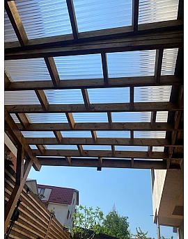 Policarbonat compact/solid cutat trapez, la rolă, grosime 1mm, protejat UV, lățime 1.26m (vânzare la metru liniar), transparent-clar