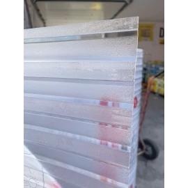 Policarbonat compact/solid cutat trapez, la rolă, grosime 1mm, protejat UV, lățime 1.26m (vânzare la metru liniar), transparent-clar