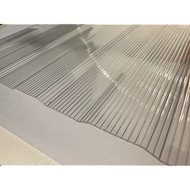 Policarbonat compact/solid cutat trapez 50/5, grosime 1mm, rolă 20 ml,  protejat UV, lățime 1.26m, transparent-clar (preț/rolă)