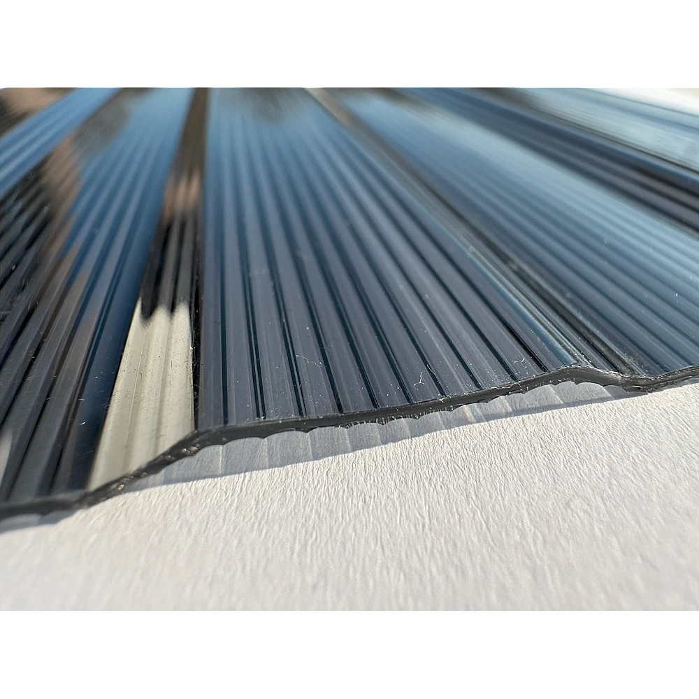 Policarbonat compact/solid cutat trapez 50/5, grosime 1mm, rolă 20 ml,  protejat UV, lățime 1.26m, negru (preț/rolă)