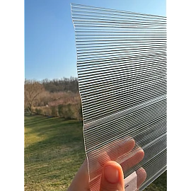 Policarbonat compact/solid cutat trapez 50/5, grosime 1mm, rolă 20 ml,  protejat UV, lățime 1.26m, transparent-clar (preț/rolă)
